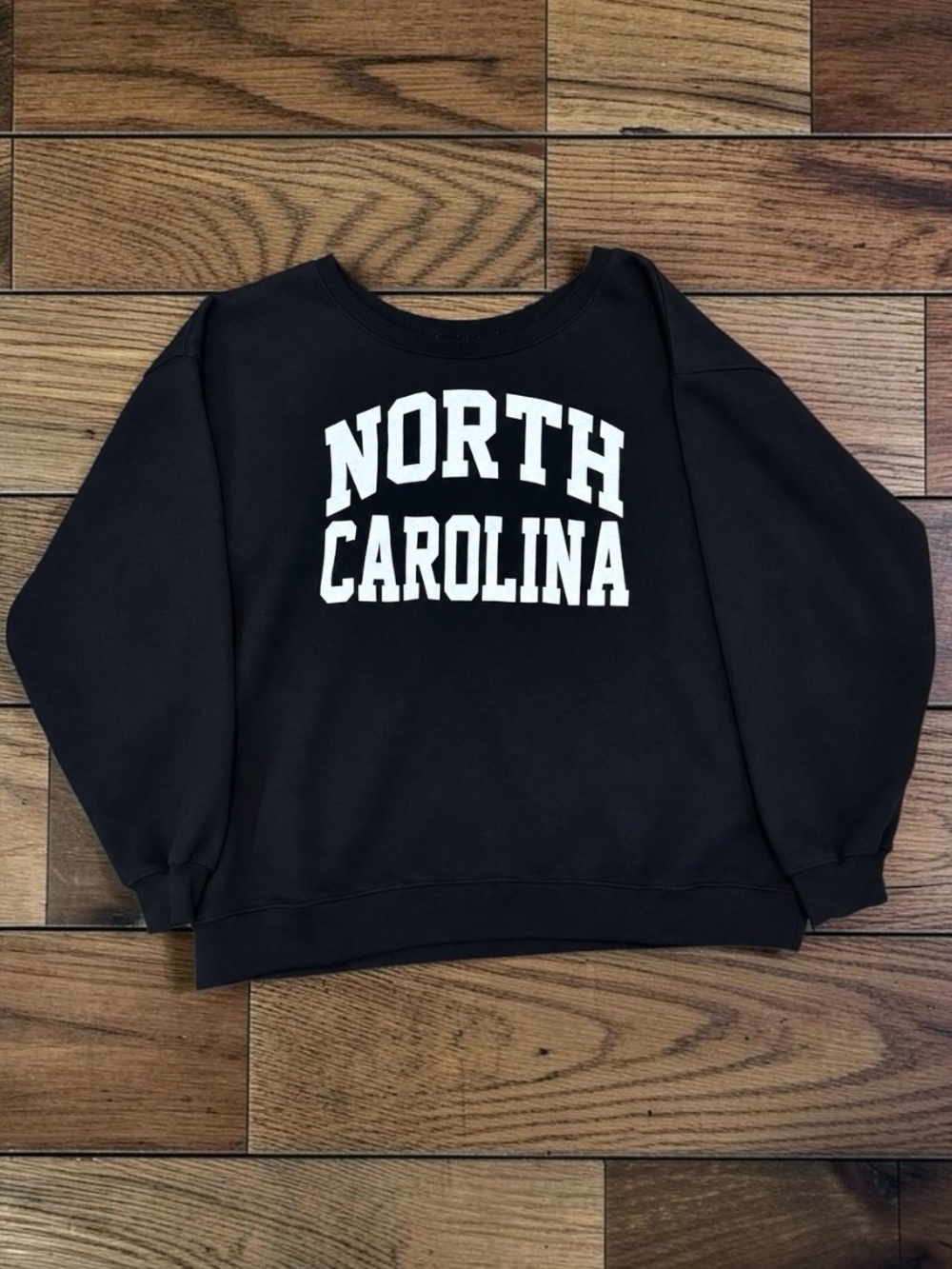 Women’s North Carolina Black Collegiate Off Shoulder Crewneck Sweatshirt